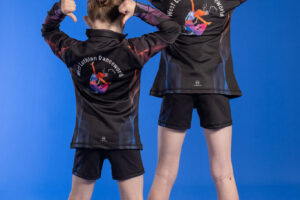 thumbs pointing to logo (lacey and missi)